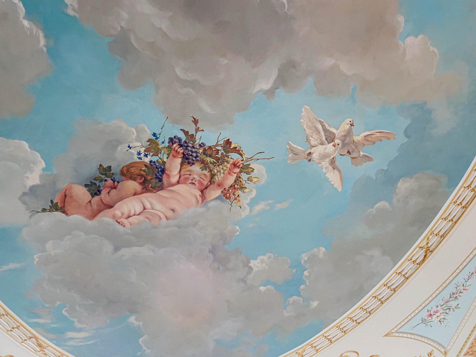 Hand-painted ceiling fresco of cherubs and doves among clouds by Kim Delaney