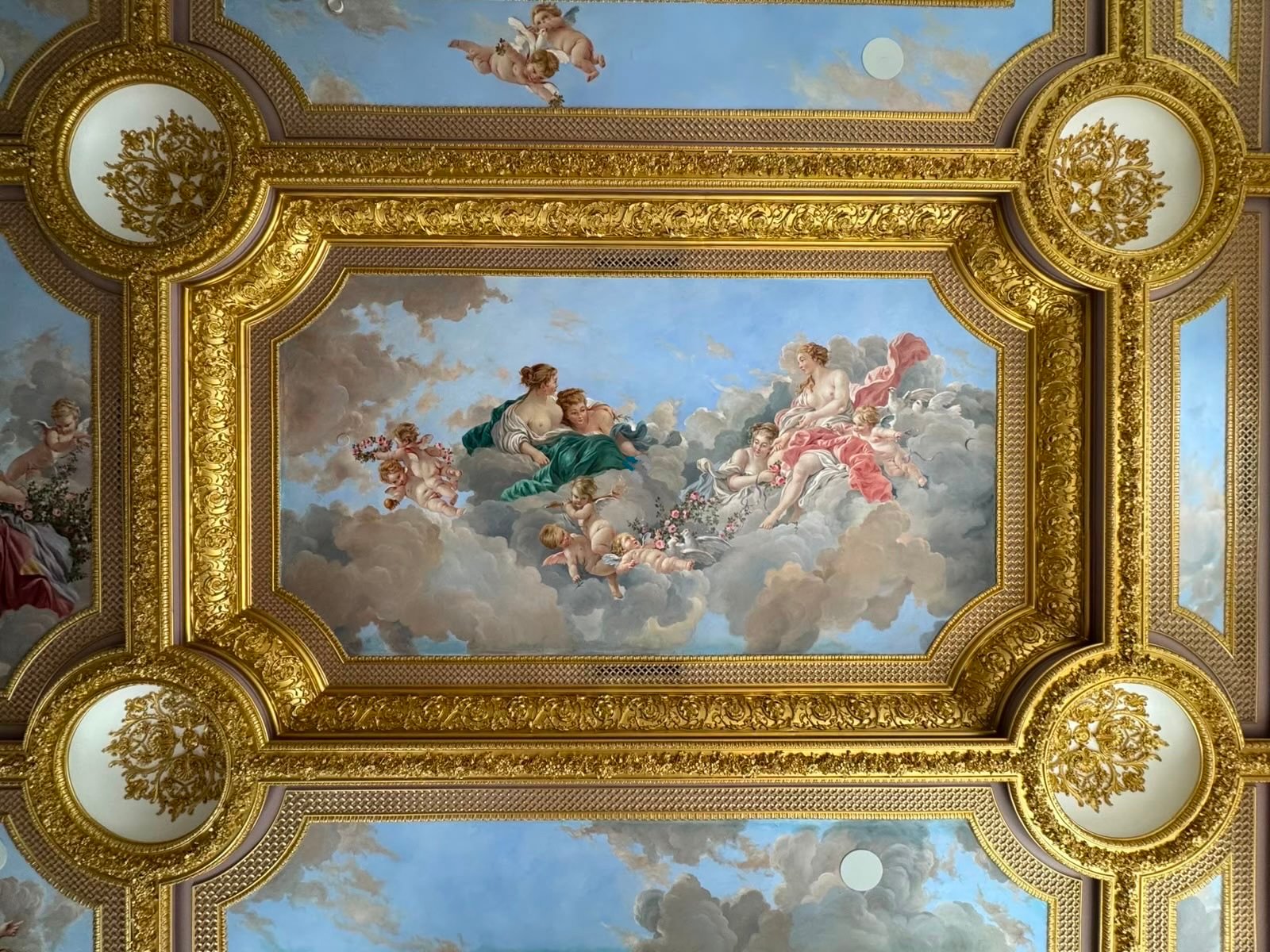 Coffered gilded ceiling with hand-painted fresco of figures in clouds by Kim Delaney