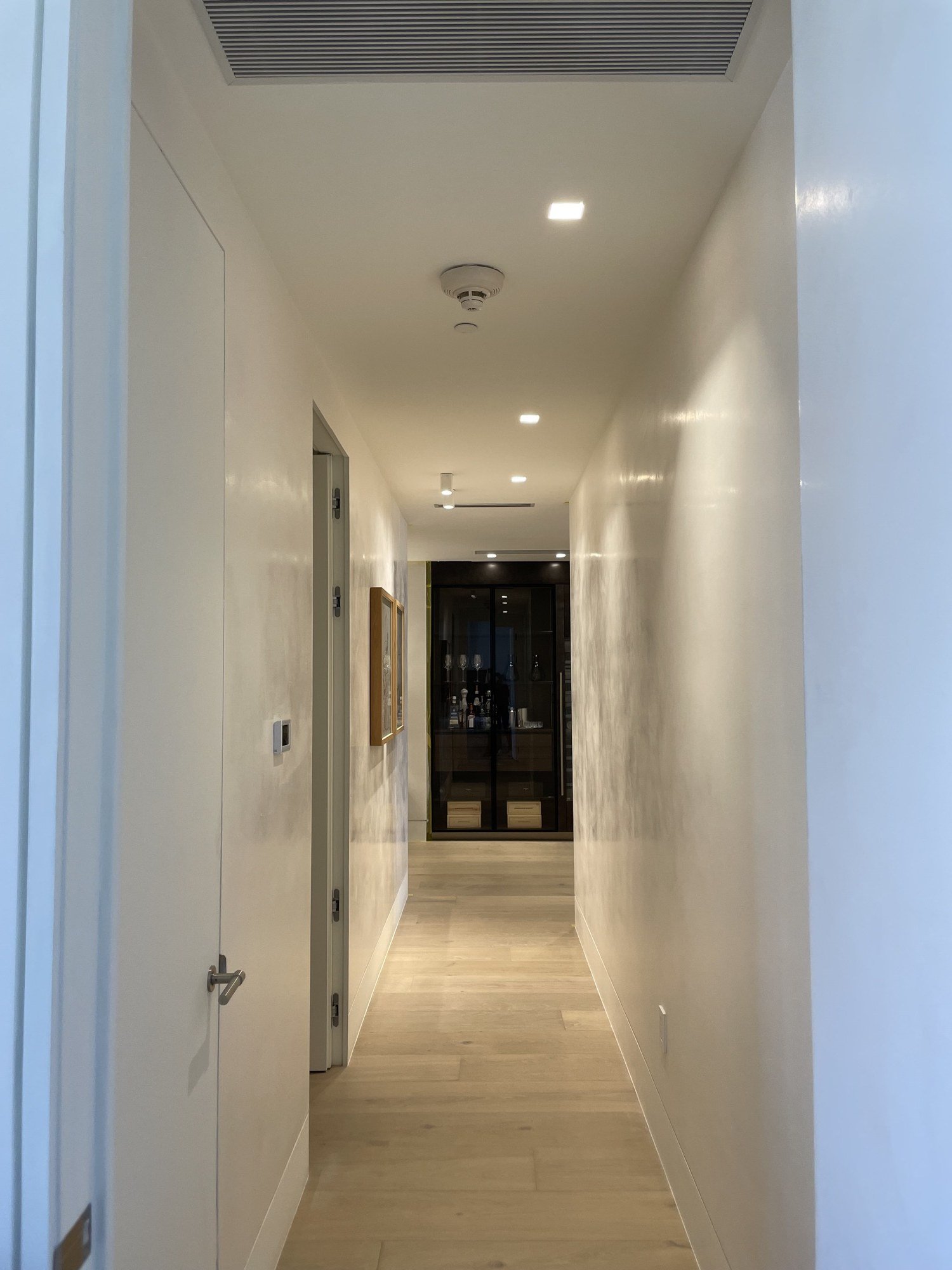 Softly shimmering plaster corridor by Kim Delaney, Delaney Fine Finishes