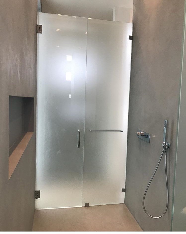 Walk-in shower in gray polished waterproof plaster by Kim Delaney, Delaney Fine Finishes